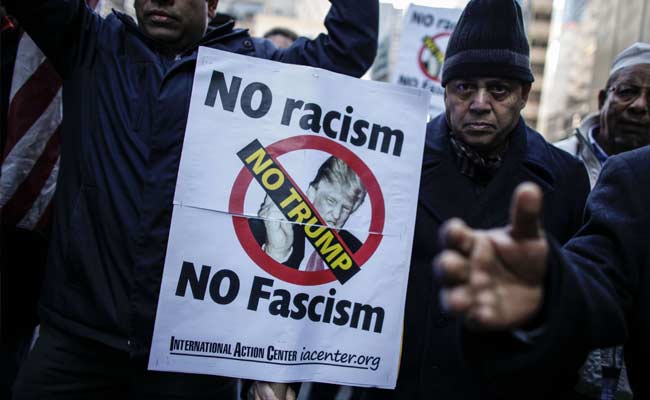 muslims-trump-tower-afp_650x400_51452367218.jpg